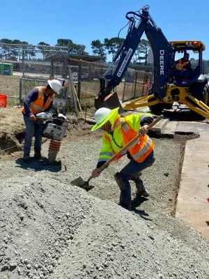 Two construction workers on the job