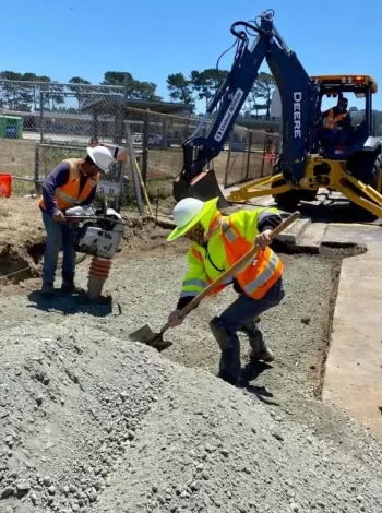 Two construction workers on the job